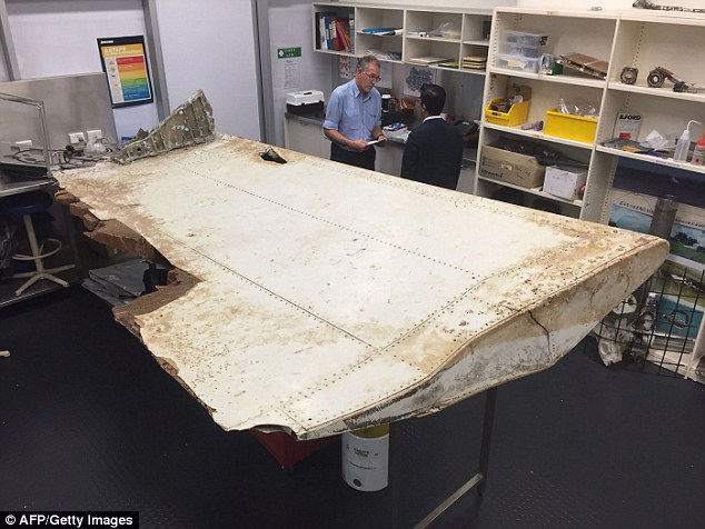 Inner part of the MH370 right wing outer flap debris, trailing edge missing