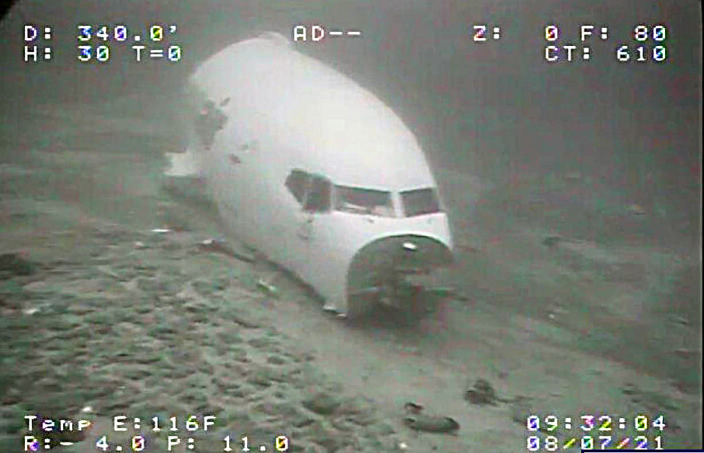 Transair Flight 810 Boeing 737 Cargo foreward fuselage wreck - proposed similarity with MH370